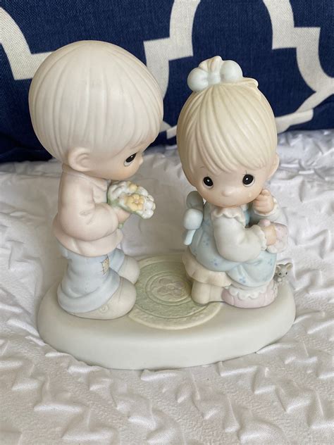 Precious moments by enesco - 1988 Enesco Precious Moments music box plays "Always" boy swinging girl. 7 inches from top of birds head to base and base is 4 1/2 inches long and almost 4 inches wide at base. Excellent working condition.
